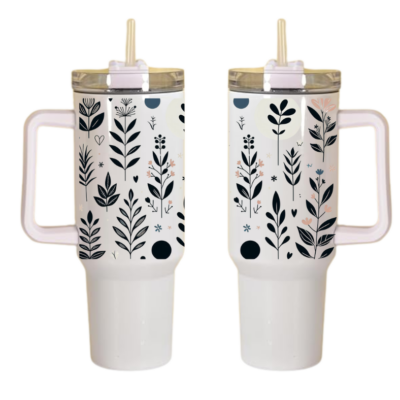 Two white travel mugs with botanical prints and beige lids, equipped with straws and handles. 40 oz tumbler like Stanley